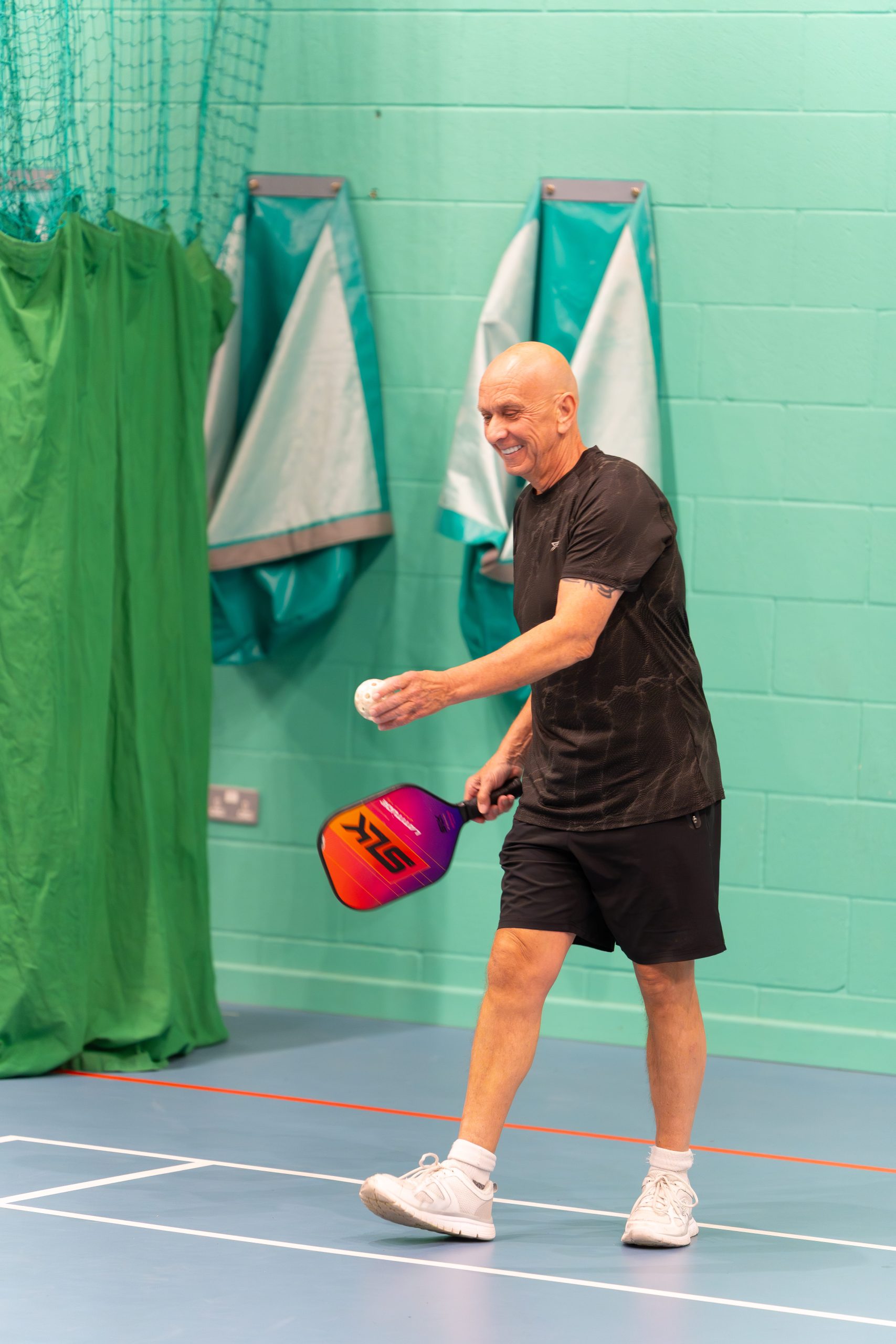 Man playing pickleball at Hereford Leisure Centre in Sports Hall